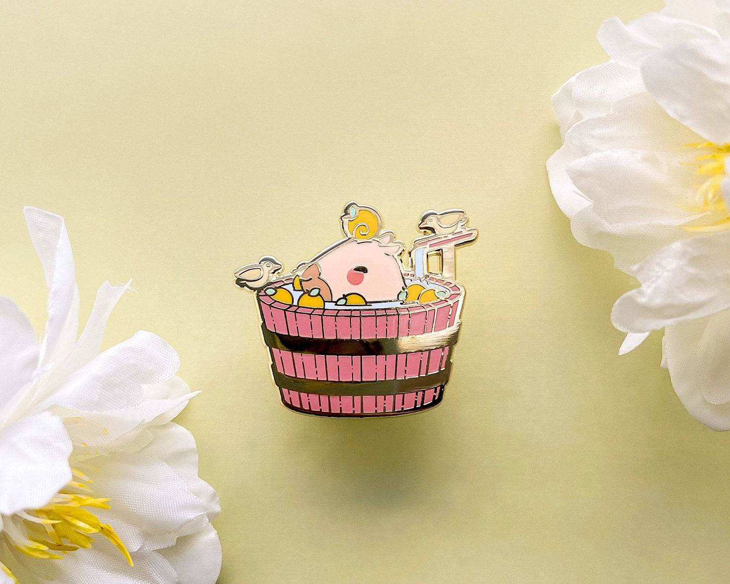 Curly the Capybara in a Bucket Spa Enamel Pin - Gold Plated Base