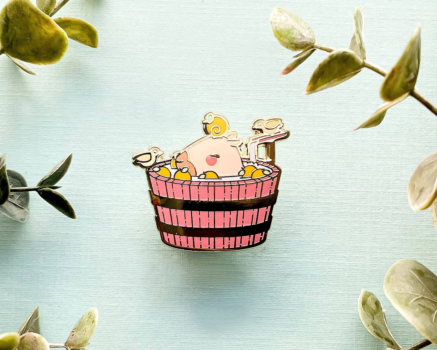 Curly the Capybara in a Bucket Spa Enamel Pin - Gold Plated Base
